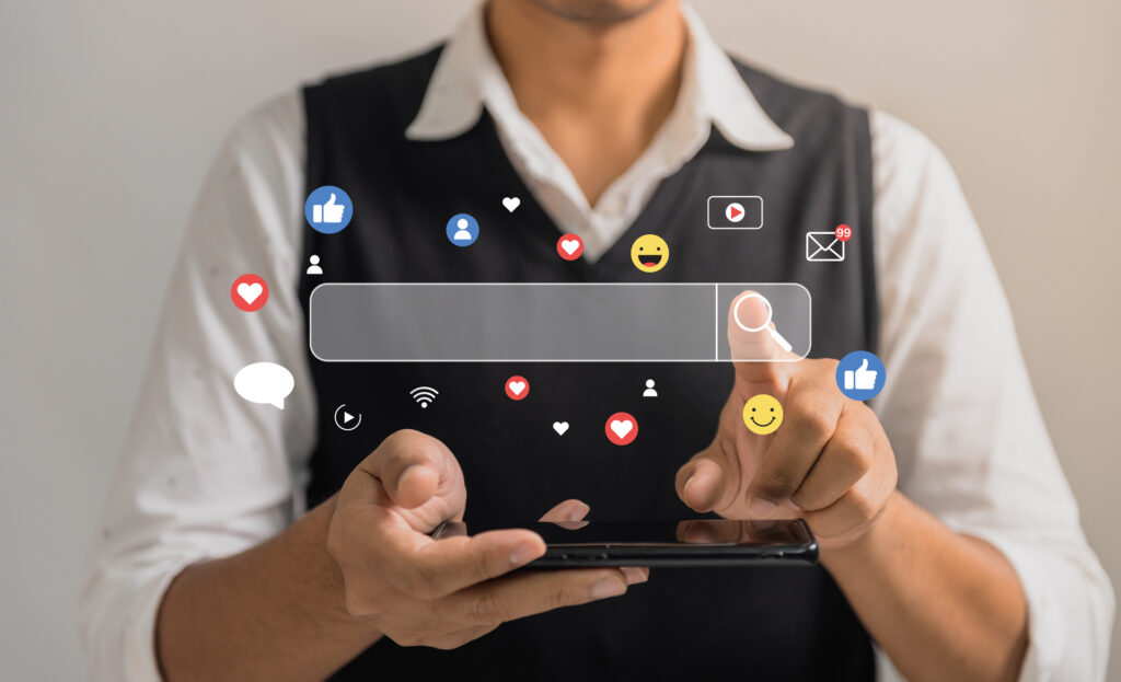 man using smartphone to work about search engine and social medi man using smartphone to work about search engine and social medi